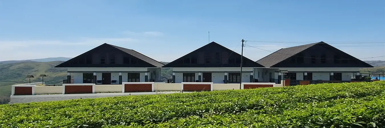 Modern hilltop resort cottages set against a clear sky at The Felmel Resort Vagamon