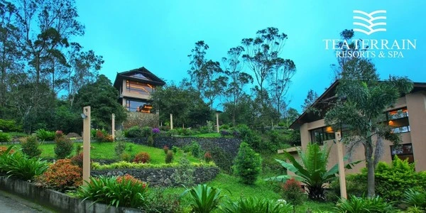 Luxury resort building exterior and outdoor swimming pool at Molly's Retreat Kovalam