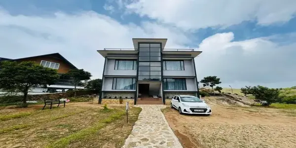 Front facade and entrance of Rock View Resort Vagamon with open sky
