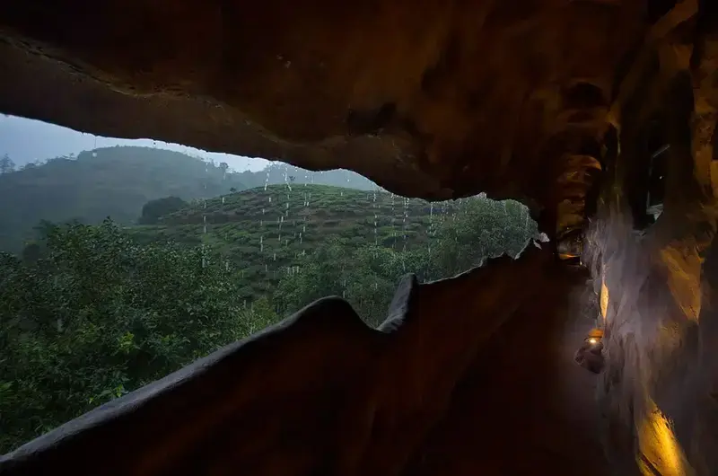 Unique cave cottage architecture embedded in natural rock formations at Foggy Knolls Resort Vagamon