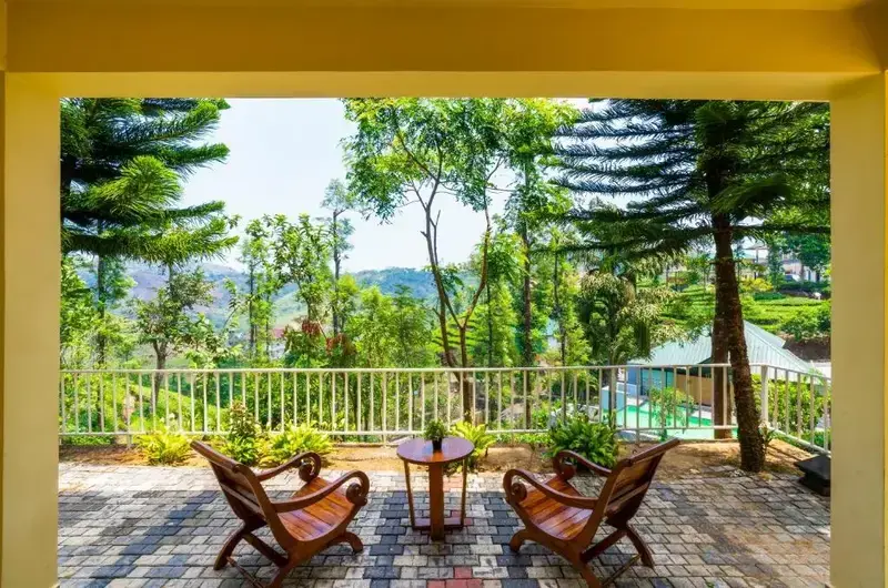 Cozy indoor seating area inside premium cottage room at Winter Vale Green Stay Vagamon