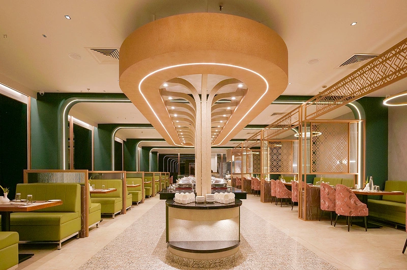 Elegantly illuminated luxury interior lobby with warm decorative lighting and seating at Palette Hill View Resort