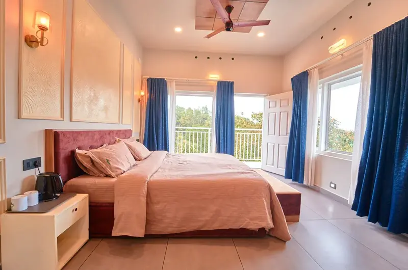 Cozy premium bedroom interior for couples at Voye Homes Vagamon resort villa.