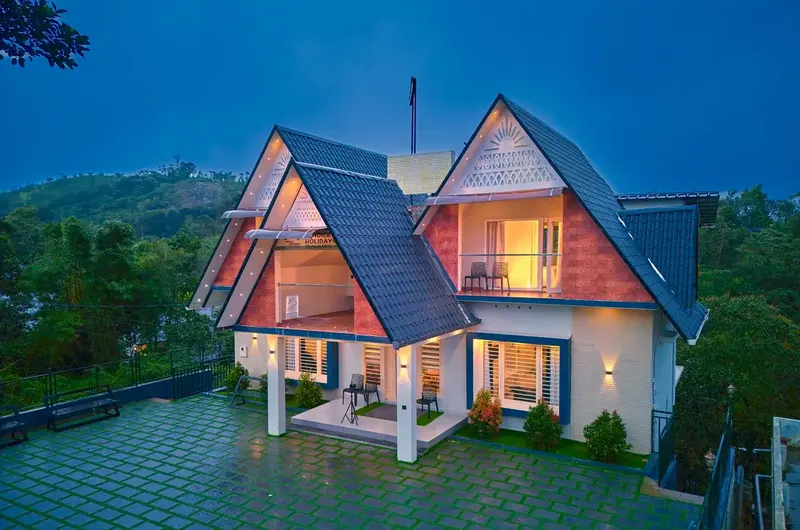 Exterior evening view of premium resort villas in Vagamon for family staycation.