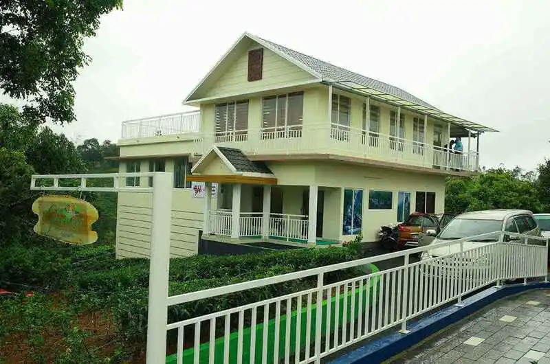 Front exterior view of a premium white two-story villa building at The Grasmere Resort Vagamon.
