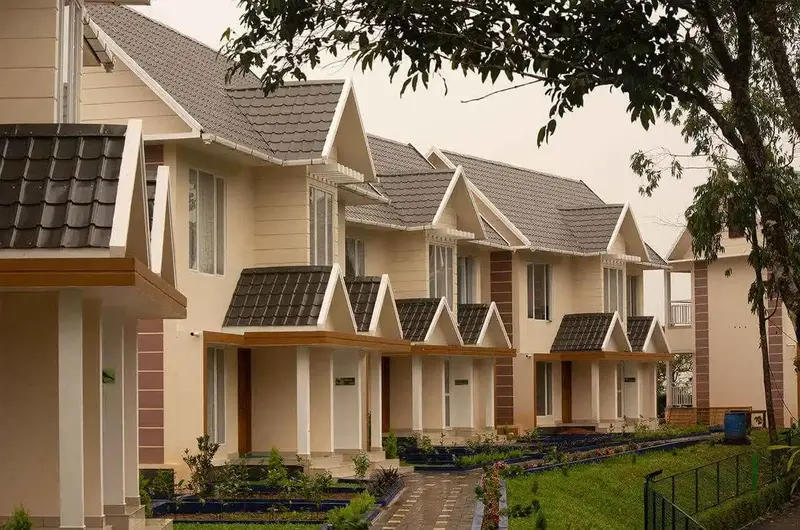 Row of premium luxury villas with elegant pathways at The Grasmere Resort Vagamon.