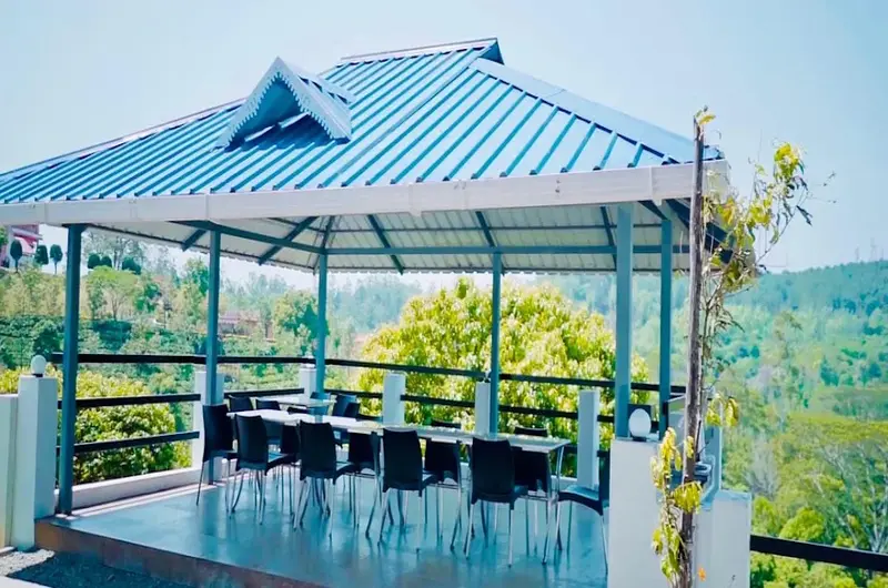 Covered rooftop seating lounge deck with panoramic mountain valley views