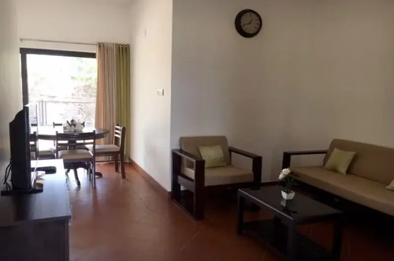 Spacious resort lounge interior with comfortable sofas and panoramic view at Beyond Pines Vagamon