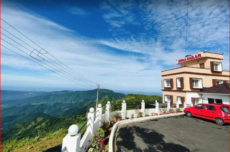 Hilltop exterior view of Himasailam Resort overlooking green valleys in Vagamon