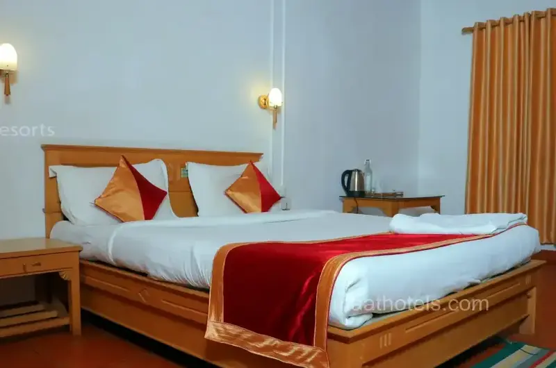 Well-appointed guest room with comfortable double bed and stylish decor at The Autumn by Maat Hotels Vagamon