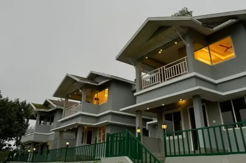 Exterior view of The Autumn by Maat Hotels Vagamon nestled in hills
