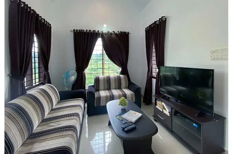 Spacious resort living room interior with plush sofa seating at Angel's Vagamon