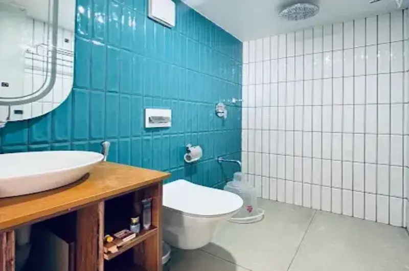 Modern ensuite bathroom interior with shower and vanity unit at Willmount Geodesic Domes Vagamon