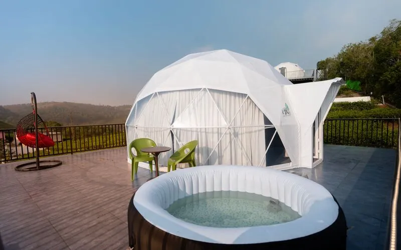 Outdoor jacuzzi plunge pool on private wooden deck at Pendora Glamps Vagamon