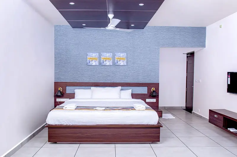 Modern air-conditioned resort bedroom interior at Le Collines Resort Vagamon