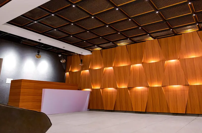 Warm illuminated accent wall design inside Le Collines Resort Vagamon