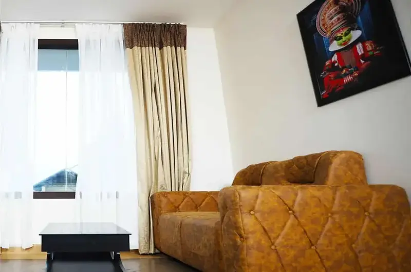 Modern luxury resort suite living room with leather sofa at Mountain Mist Resort Vagamon