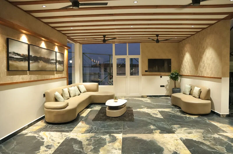Spacious luxury resort lobby and seating lounge area at Olga Resorts Vagamon
