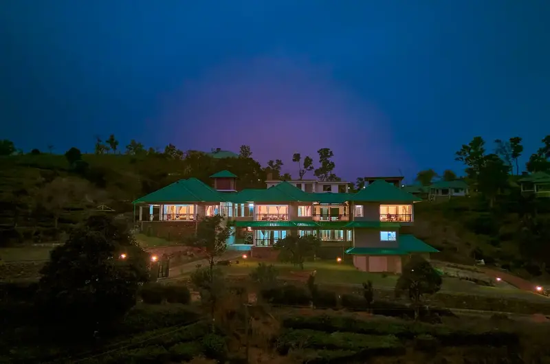 Priyas Villa Vagamon illuminated exterior view at dusk