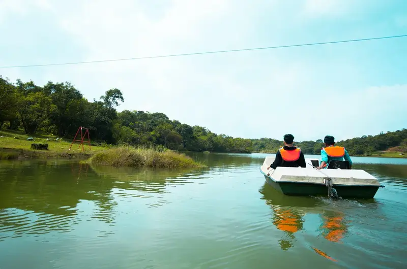 Pedal boating on scenic lake near Priyas Villa Vagamon