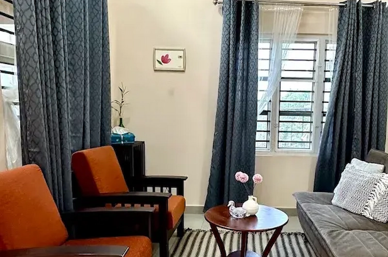 Cozy living room seating area with modern decor at 8.5 Acres Vagamon