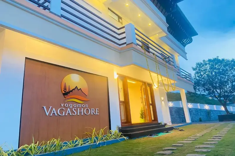 Warmly lit entrance and reception building of Vagamon Vagashore resort