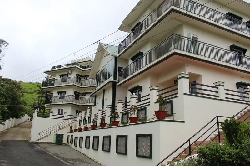 Exterior view of Pine Clough Resort main accommodation building in Vagamon