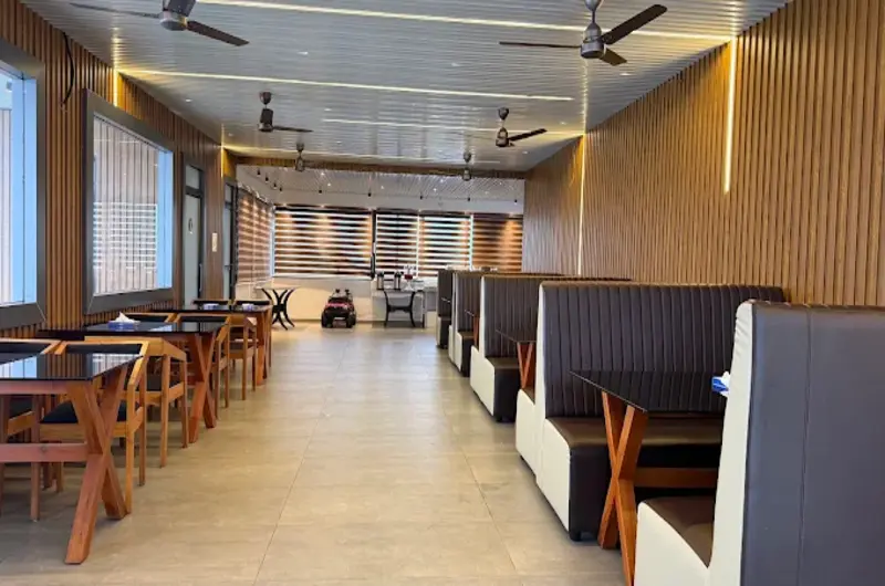 Spacious resort restaurant and dining hall at Golden Meadows Resort Vagamon