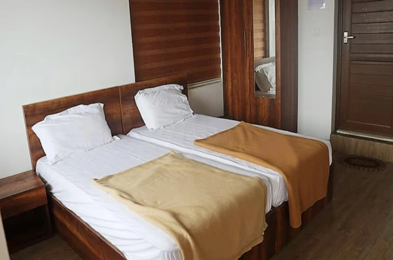 Comfortable double bed room accommodation at Vagamon Hill Chimes resort