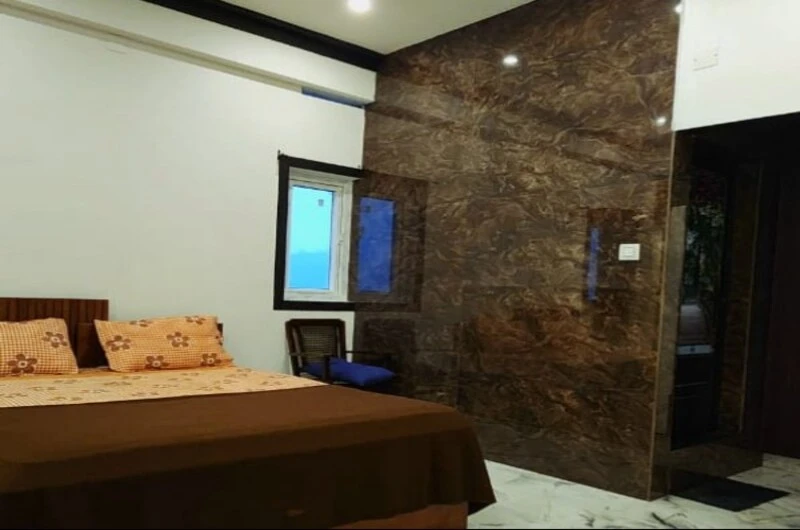 Spacious double bedroom suite with modern decor at Rock Lake Villa