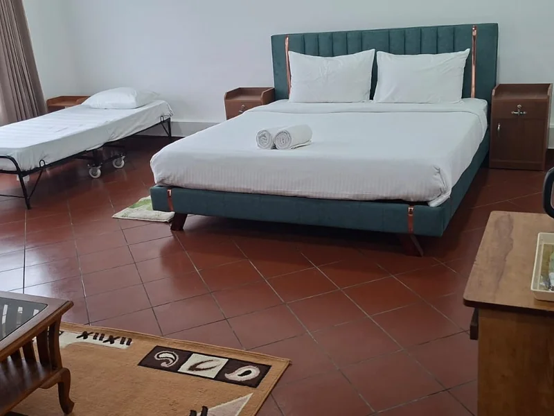 Comfortable room with twin beds at Zen Garden Wellness Homestay in Vagamon