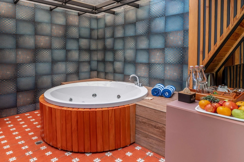 Luxury indoor jacuzzi tub and relaxation area at Santuario Resort Vagamon